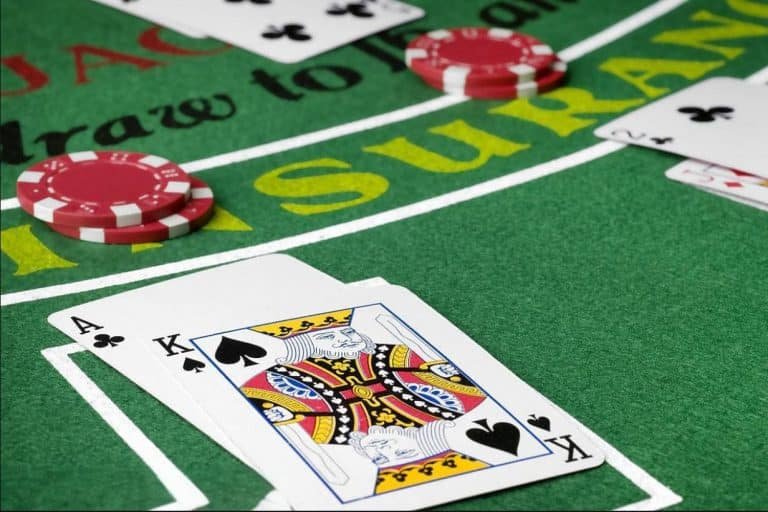 Live casino baccarat table streamed to Filipino player on smartphone